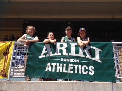 Kids with Club Banner Ariki Athletics